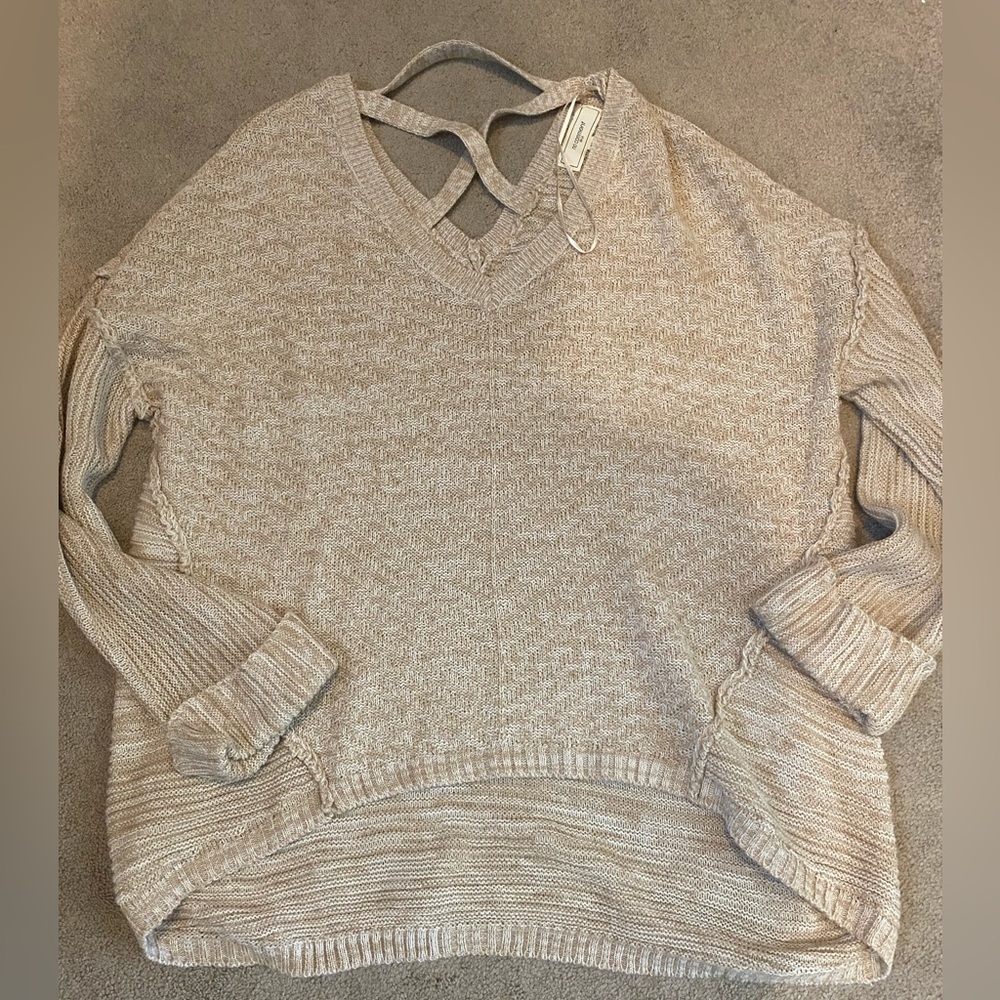 Sweater size small (fits closer to medium)